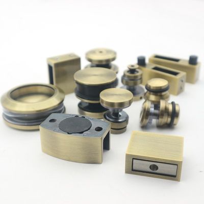 Good price Frameless SS304 Sliding Door System with Polish Gold Rollers and Frameless Design Style online